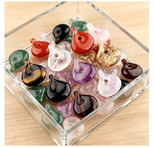 Detailed view of colorful natural gemstone drop beads with horizontal hole for DIY jewelry making.