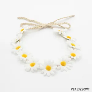 White daisy floral headband hippie 1960s style flower crown festival party hair accessory.