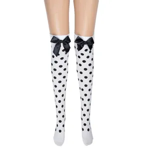 White over-the-knee stockings featuring classic black polka dots and elegant black bow accents.