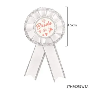 White bridal shower rosette badge with 'Bride To Be' text, perfect for bachelorette party.