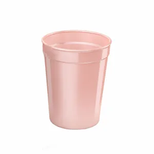Macaron pink bachelorette party plastic cup with Team Bride print for wedding celebrations.