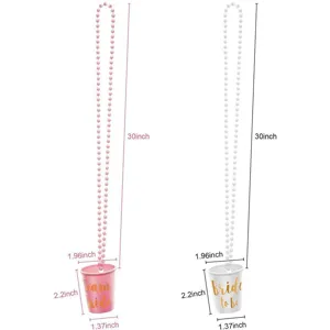 Detail view of bachelorette party cup necklace with size dimensions in pink and white.