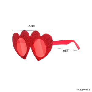 Red glitter heart party glasses for Valentine's Day celebration and holiday dress up.