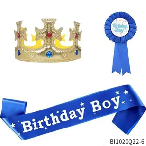Birthday boy party set with gold crown rosette badge and blue sash for kids celebration