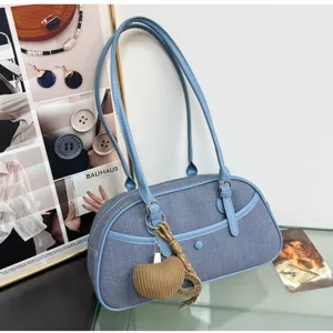 Blue denim shoulder bag, casual underarm baguette handbag with cute heart charm for daily.