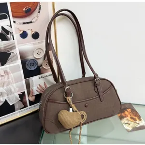 Brown stylish shoulder bag underarm bag fashion retro casual baguette bag with heart charm.