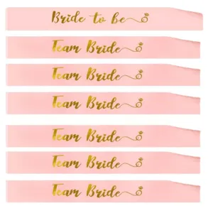 Conjunto de bandas rosas para despedida de soltera con letras doradas novia y equipo novia.