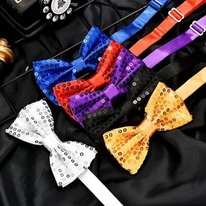 Set di cravattini a farfalla con paillettes colorate, ideale per spettacoli e feste.