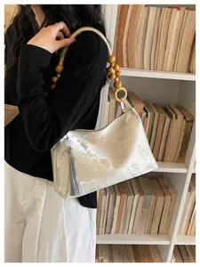 New Chinese style jacquard shoulder underarm bag with wooden bead handle and elegant tassel.