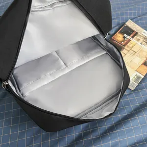 Detailed view of the black backpack interior showing spacious compartments and light gray lining.
