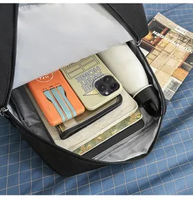 Large capacity black backpack detail view showing spacious interior storage and compartments.