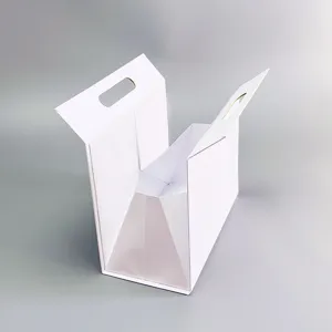 Vue détaillée de la boîte cadeau pliante magnétique triangulaire blanche, sac en papier pliable.