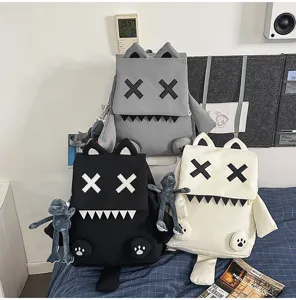 Cute cartoon monster school backpack with XX eyes design, casual daily student travel bag.