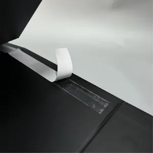 Foldable gift box adhesive strip detail view, easy assembly black packaging box display.