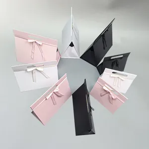 Foldable bow gift box in black white and pink colors detail view for cosmetic packing