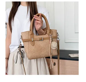 Women retro crossbody handbag detail view, chic commuter shoulder tote bag for summer.