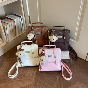Women casual fashion college style small backpack with cute bear keychain for daily commute
