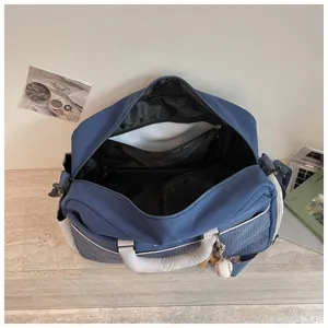 Large capacity travel duffel bag, lightweight gym sports bag with compartments for short trips.