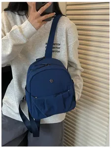 Stylish women's mini backpack in dark blue, lightweight and perfect for daily casual commute.
