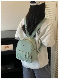 Minimalist daily backpack for women lightweight green school bag casual commuting daypack aesthetic