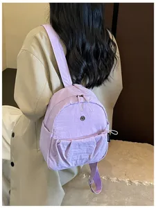 Lightweight minimalist casual backpack for women, stylish daily commuting purple daypack.