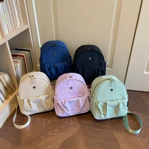 Japanese minimalist women's backpack, lightweight casual commuter school bag, multi-color.
