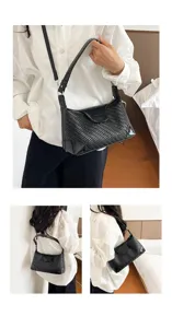 Black woven leather shoulder bag for women, chic underarm handbag for daily casual commute.