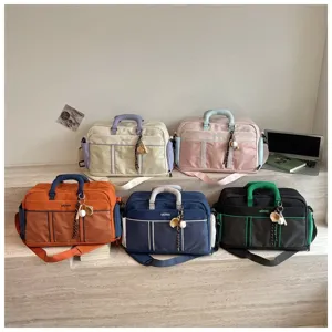 Detailed display of stylish large capacity travel duffel bags in multiple colors on display.