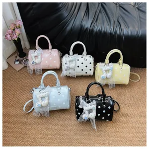 Chic polka dot pillow handbag set featuring cute lace musical note pendants and colors.