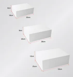 Detailed view of white folding gift boxes in three sizes with dimension guides for packaging.