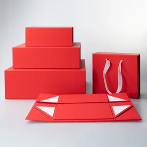 Red folding gift boxes detail view, premium cardboard packaging for present storage display.