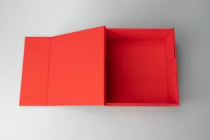 Close-up detail of the red folding gift box interior, magnetic flap open view structure.