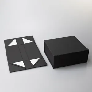 Detail view of black foldable gift box showing unfolded flat structure and assembled form.