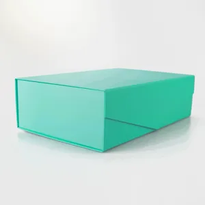 Vue détaillée de boîte cadeau pliante cyan, emballage élégant à fermeture magnétique.