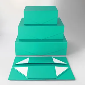 Ensemble de boîtes cadeaux pliantes magnétiques cyan avec couvercle pour emballage de luxe.