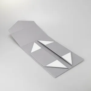 Detailansicht der faltbaren starren Geschenkschachtel, graue magnetische Faltpapierstruktur.