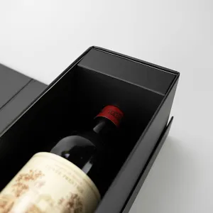 Boîte cadeau de vin pliable noire de haute qualité, design compact pour rangement.
