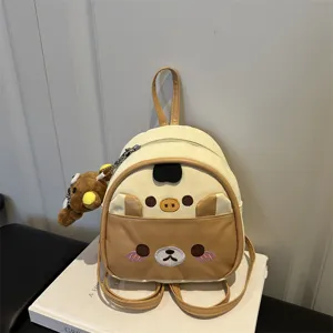 Mini cute cartoon bear PU leather backpack for women and kids, stylish casual mini school bag.