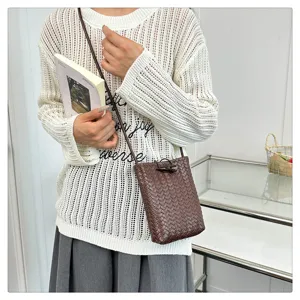 Woven PU leather phone crossbody bag for women, stylish mini shoulder bag with horn button.