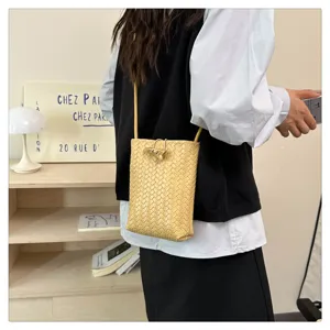 Fashion woven PU leather crossbody phone bag with stylish horn buckle for daily use.