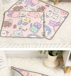 Pet sleeping mat detail view, soft quilted fabric with cute animal patterns for all seasons.