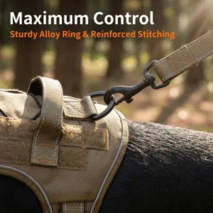 Tactical dog harness detail view showing sturdy alloy ring, reinforced stitching, and control handle.