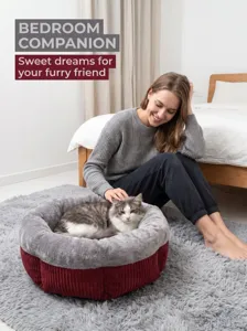 Cozy round pet bed with soft plush rim and durable corduroy base for cats and dogs