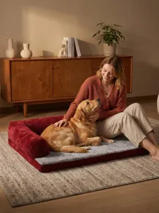 Cozy dog sofa bed with soft plush cushion and durable corduroy rim for pets comfort.
