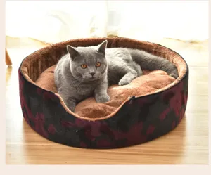 Round plush pet bed with removable zipper cover for cats and small dogs detail view.