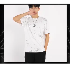 Detail view of the men's white short sleeve t-shirt featuring stylish abstract print graphics.