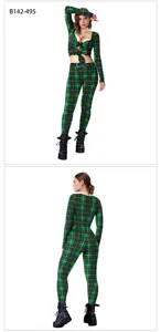 Green plaid St. Patrick's festival costume detail showcasing the long sleeve top and pants.