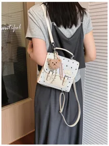 College style bow print mini backpack for women, cute summer casual travel daypack.