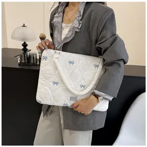 Korean style quilted laptop bag with blue bow embroidery, cute white shoulder tote bag.
