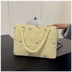 Korean style quilted laptop bag with blue bow embroidery, cute yellow tablet storage handbag.